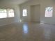 Bright living room with tile flooring and views of the outdoor area at 5488 Apron Ct, Las Vegas, NV 89122