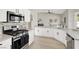 Gourmet kitchen showcasing stainless steel appliances and modern finishes at 5600 Blue Peak Ave, Las Vegas, NV 89131