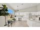 Bright kitchen boasts ample storage, white cabinets, and quartz countertops at 5600 Blue Peak Ave, Las Vegas, NV 89131