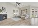 Cozy living room with fireplace, vaulted ceiling, and contemporary furnishings at 5600 Blue Peak Ave, Las Vegas, NV 89131
