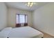 Bright bedroom with a ceiling fan with natural light from the window at 5751 E Hacienda Ave # 105, Las Vegas, NV 89122