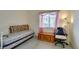Bedroom with carpet, window, and decor; great natural light at 5751 E Hacienda Ave # 105, Las Vegas, NV 89122