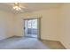 Bright and airy bedroom with sliding glass doors to balcony that provides natural light and outdoor access at 5751 E Hacienda Ave # 105, Las Vegas, NV 89122