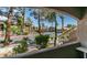 Enjoy the tranquil views of the lush landscaping and buildings from your balcony at 5751 E Hacienda Ave # 105, Las Vegas, NV 89122