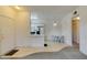 Kitchen and dining area featuring bright lighting and an open layout with an adjacent bathroom entrance at 5751 E Hacienda Ave # 105, Las Vegas, NV 89122