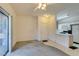 Bright living area leading into the kitchen with views to the outside patio at 5751 E Hacienda Ave # 105, Las Vegas, NV 89122