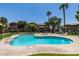 Take a dip in this community pool surrounded by lounge chairs and manicured landscaping at 5751 E Hacienda Ave # 105, Las Vegas, NV 89122