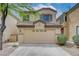 Charming two-story home featuring a two-car garage and a well-maintained front yard at 6549 Butterfly Sky St, North Las Vegas, NV 89084
