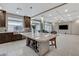 Spacious open-concept kitchen area features a large central island with room for seating at 6618 Tangled Vines Ave, Las Vegas, NV 89139