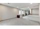 View of a large loft area with carpeting, a built-in desk, and neutral paint at 6618 Tangled Vines Ave, Las Vegas, NV 89139