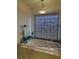 Bathroom with an elegant bathtub with bamboo shades above at 6841 Longmeadow Dr, Pahrump, NV 89061