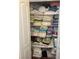 Organized linen closet, shelves stacked with neatly folded sheets, blankets, and other textiles at 6841 Longmeadow Dr, Pahrump, NV 89061