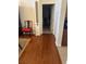 Wood hallway leading to other rooms at 6841 Longmeadow Dr, Pahrump, NV 89061
