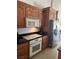 Kitchen with oak cabinets, granite countertops, and stainless steel appliances at 6841 Longmeadow Dr, Pahrump, NV 89061