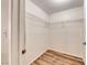 Walk-in closet with wood-look floors and wire shelving for optimal storage space at 6916 Dorita Ave # 102, Las Vegas, NV 89108