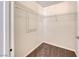 Walk-in closet with carpet flooring and metal shelving for organized storage at 6916 Dorita Ave # 102, Las Vegas, NV 89108