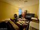 Neutral bedroom with dark furniture and striped rug at 6955 Grassy Knoll St, Las Vegas, NV 89147