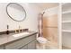 Bathroom with modern vanity, stylish faucet, and shower-tub combination with a patterned shower curtain at 711 Sari Dr, Las Vegas, NV 89110