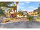 Charming stucco home with mature landscaping and mountain views in a serene setting at 711 Sari Dr, Las Vegas, NV 89110