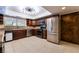 Kitchen area with stainless steel appliances, tile floor and ample cabinet space at 711 Sari Dr, Las Vegas, NV 89110