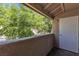 Balcony with green tree and garden views at 7200 Pirates Cove Rd # 2025, Las Vegas, NV 89145