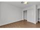 Bright bedroom with a ceiling fan and a sliding door closet at 7200 Pirates Cove Rd # 2025, Las Vegas, NV 89145