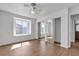 Bedroom with a window, closet with mirrored doors and wood-look floors at 7200 Pirates Cove Rd # 2025, Las Vegas, NV 89145