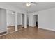 Bedroom with a window, closet with mirrored doors, and an ensuite bathroom at 7200 Pirates Cove Rd # 2025, Las Vegas, NV 89145
