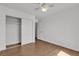Bright bedroom with a ceiling fan and a sliding door closet at 7200 Pirates Cove Rd # 2025, Las Vegas, NV 89145