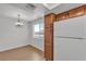 Kitchen and dining area feature natural lighting, wood cabinets, and white appliances at 7200 Pirates Cove Rd # 2025, Las Vegas, NV 89145