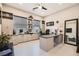Bright office with custom built in desk and cabinets, along with a ceiling fan and lots of natural light at 7473 Deschutes Cir, Las Vegas, NV 89129