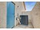 A utility area on the side of the home houses the HVAC system at 7709 Sierra Paseo Ln, Las Vegas, NV 89128