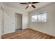 Charming bedroom with wood floors, closet, and natural light at 7709 Sierra Paseo Ln, Las Vegas, NV 89128