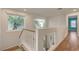Hallway boasts a large window, filling the space with natural light at 7709 Sierra Paseo Ln, Las Vegas, NV 89128