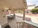 View of covered patio complete with furniture and a ceiling fan at 7851 Tidal Pool Ct, Las Vegas, NV 89139