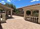 Spacious backyard patio featuring brick pavers, covered seating areas, and well-maintained landscaping at 7851 Tidal Pool Ct, Las Vegas, NV 89139