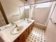 Bathroom features a dual vanity, and shower-tub combination at 7851 Tidal Pool Ct, Las Vegas, NV 89139