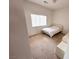 This bedroom features a window and carpet flooring at 7851 Tidal Pool Ct, Las Vegas, NV 89139