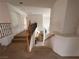 Upstairs hallway with staircase and view to dining area at 7851 Tidal Pool Ct, Las Vegas, NV 89139