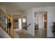 Hallway with stairs, leading to dining area and living spaces at 7851 Tidal Pool Ct, Las Vegas, NV 89139