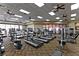 Well-equipped gym featuring modern treadmills, weight machines, and ceiling fans at 7908 House Sparrow St, North Las Vegas, NV 89084