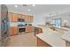 Traditional kitchen featuring light wood cabinets and stainless steel appliances at 7908 House Sparrow St, North Las Vegas, NV 89084