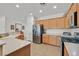 Functional kitchen featuring stainless-steel appliances, modern gas range, and ample counter space at 7908 House Sparrow St, North Las Vegas, NV 89084