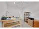 Office with shelves and a wooden desk at 7908 House Sparrow St, North Las Vegas, NV 89084