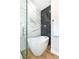 Modern white bathtub with elegant tile accents, perfect for relaxing at 8113 Bay Springs Dr, Las Vegas, NV 89128
