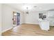 Dining nook with sliding glass doors and kitchen counter with modern lighting at 8113 Bay Springs Dr, Las Vegas, NV 89128