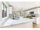 Bright kitchen featuring white countertops and cabinets, stainless steel appliances, and modern lighting at 8113 Bay Springs Dr, Las Vegas, NV 89128