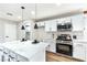 Modern kitchen featuring a center island, stainless steel appliances, and sleek cabinetry at 8113 Bay Springs Dr, Las Vegas, NV 89128