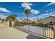 Balcony view with iron railing, palm trees, and an overlooking perspective of nearby homes at 8217 Fritzen Ave, Las Vegas, NV 89131