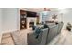 Cozy living room features a fireplace, built-in shelving and comfortable seating at 8217 Fritzen Ave, Las Vegas, NV 89131